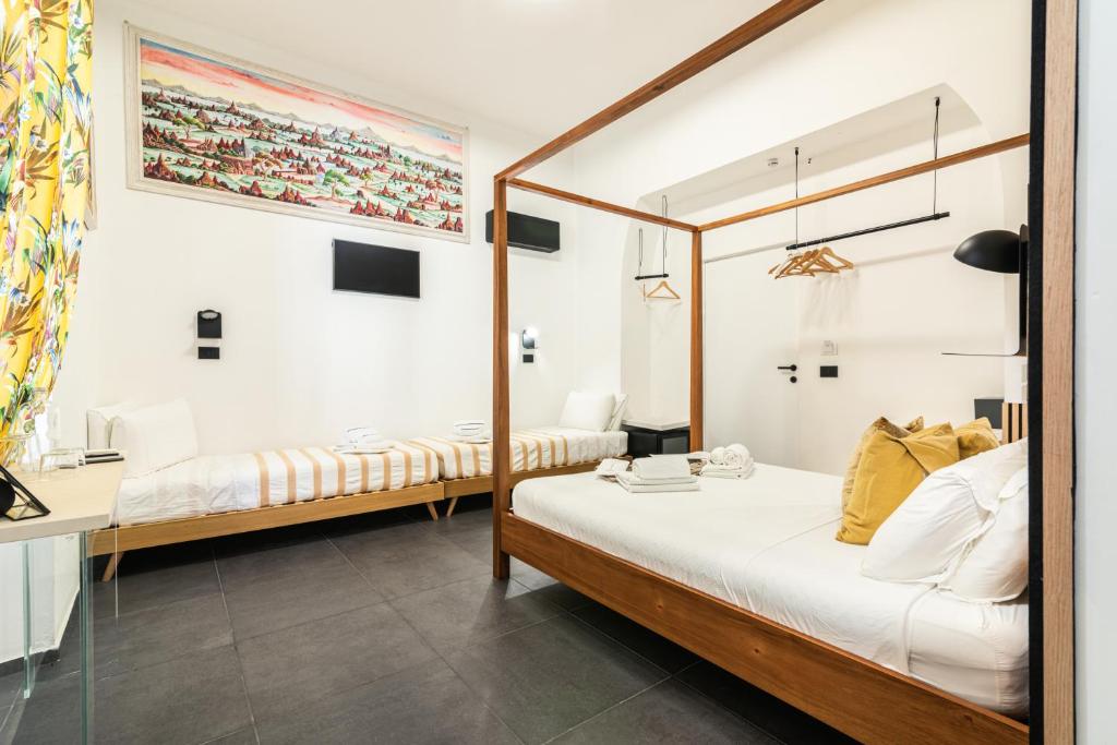 Postel nebo postele na pokoji v ubytování Luxury B&b Euphorbia