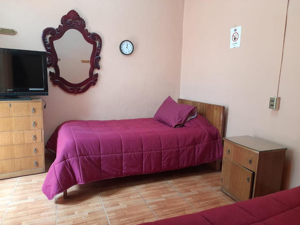 Postel nebo postele na pokoji v ubytování Residencial S'cala