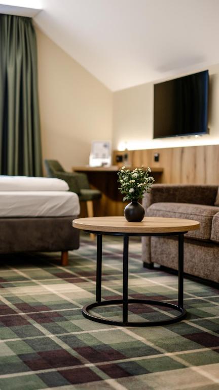 TV a/nebo společenská místnost v ubytování Hotel Restaurant Erber