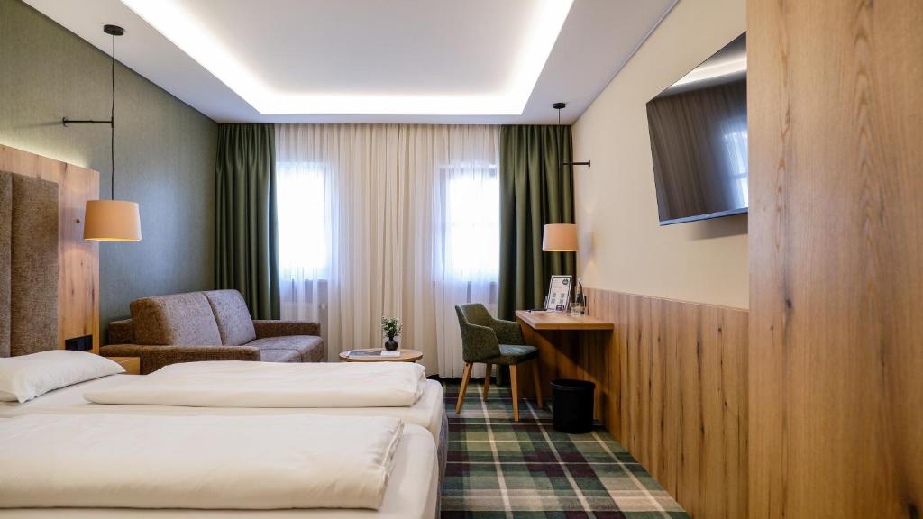Postel nebo postele na pokoji v ubytování Hotel Restaurant Erber