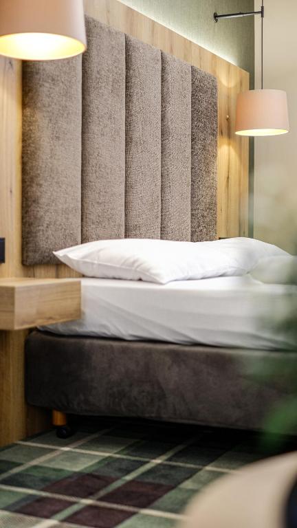 Postel nebo postele na pokoji v ubytování Hotel Restaurant Erber