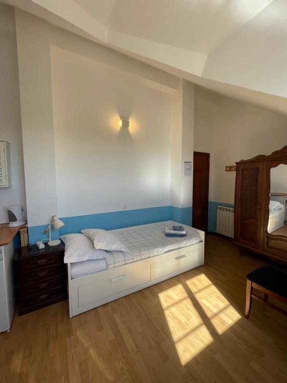 Postel nebo postele na pokoji v ubytování Hotel Jardim Oudinot "MyWay Kite&Surf"