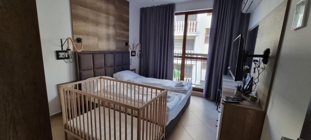 Postel nebo postele na pokoji v ubytování Luxury Apartments in Cascadas Family Resort Sunny Beach