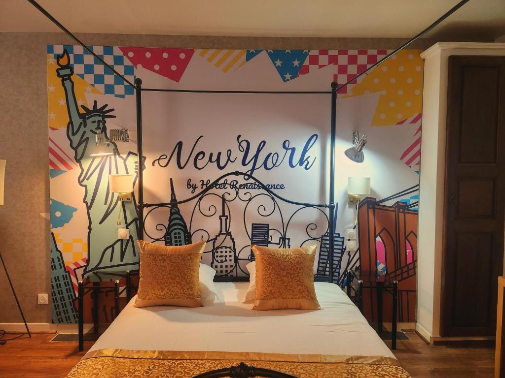 Letto o letti in una camera di Hôtel Renaissance