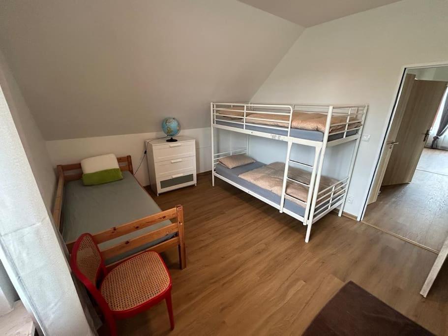Postel nebo postele na pokoji v ubytování Vacation apartment in Bruntál for trips & outdoor