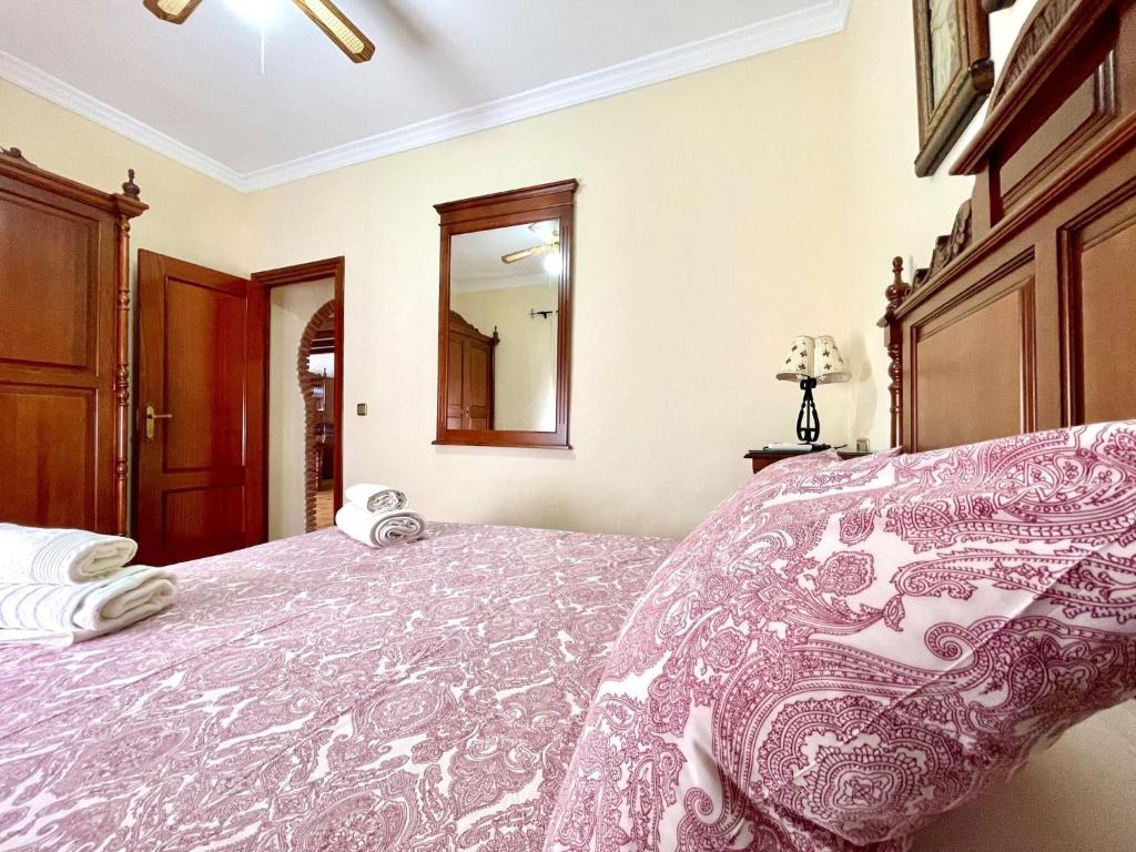 Posteľ alebo postele v izbe v ubytovaní Belvilla by OYO Casa Mirador