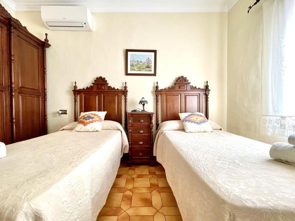 Posteľ alebo postele v izbe v ubytovaní Belvilla by OYO Casa Mirador