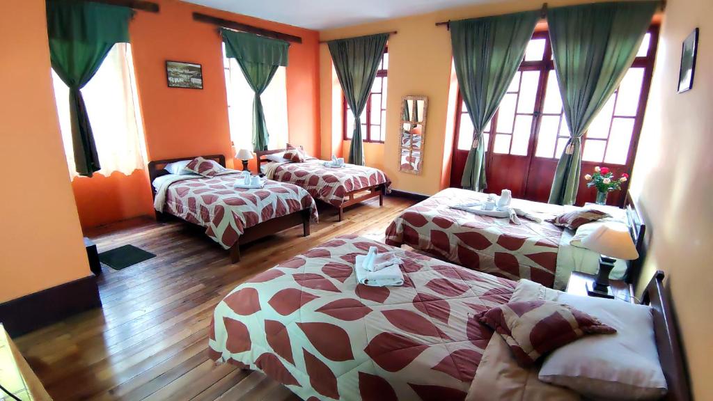 Postel nebo postele na pokoji v ubytování La Posada Colonial