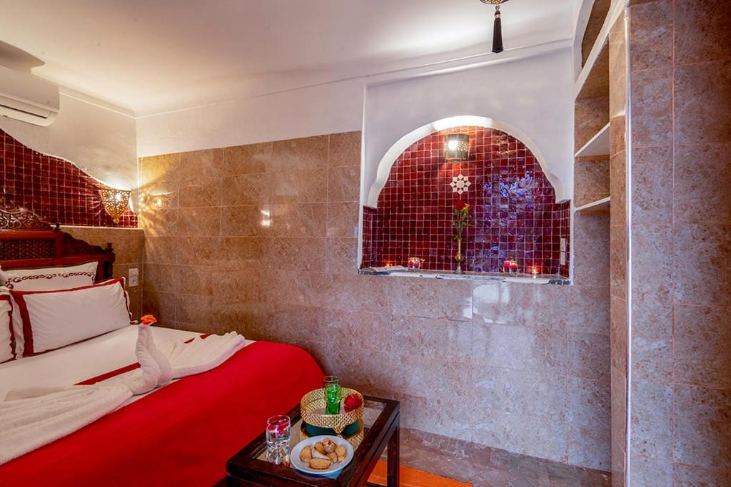 Postel nebo postele na pokoji v ubytování Riad Zehar & Spa Marrakech