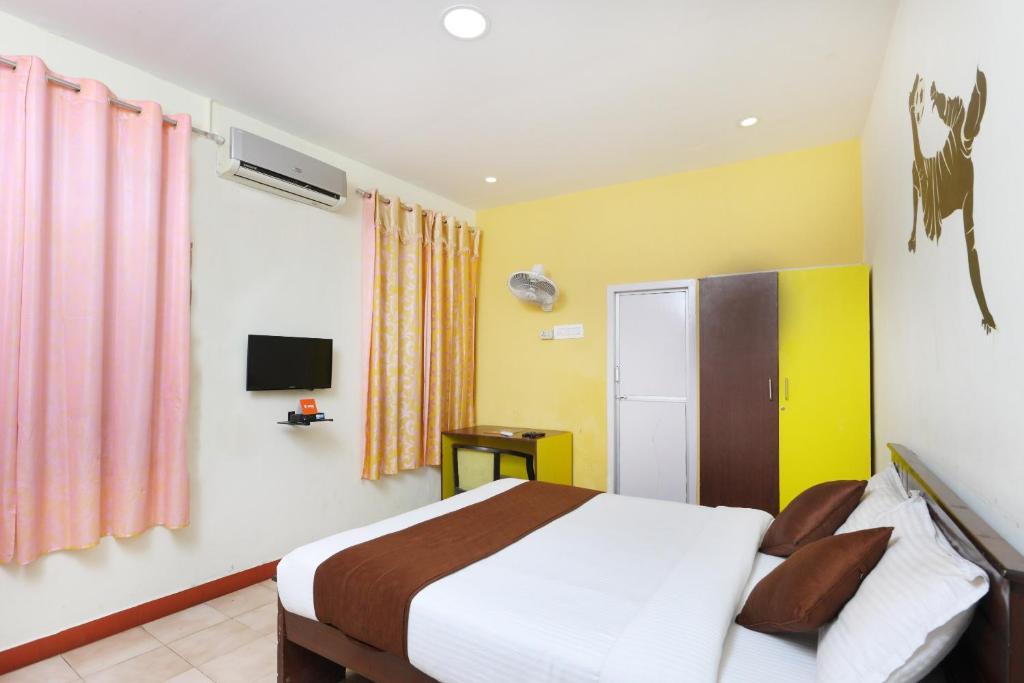 Postel nebo postele na pokoji v ubytování Hotel O India Gate Par View