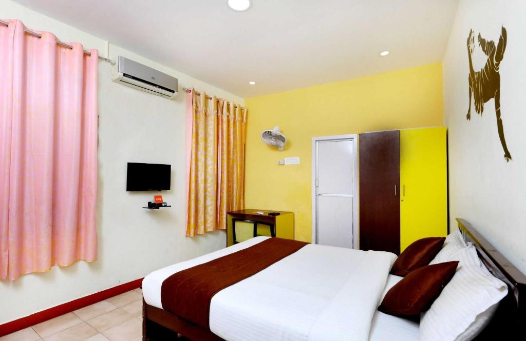 Postel nebo postele na pokoji v ubytování Hotel O India Gate Par View