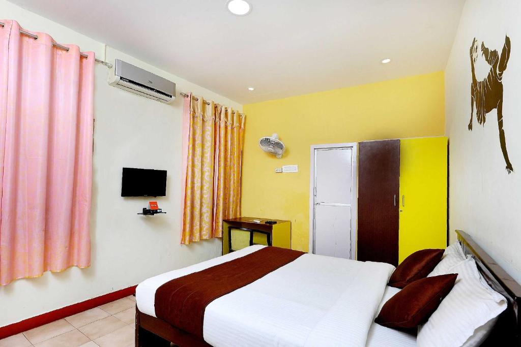 Postel nebo postele na pokoji v ubytování Hotel O India Gate Par View