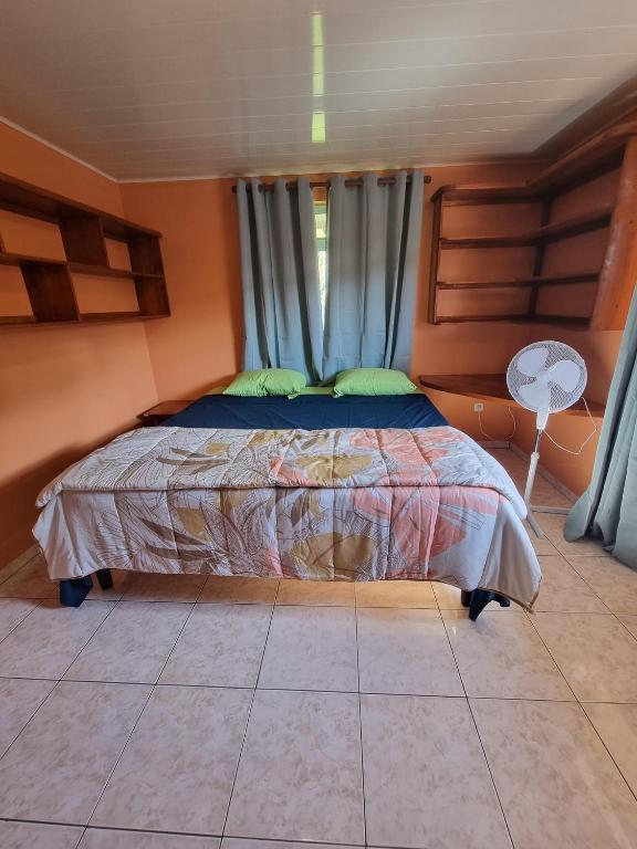 Postel nebo postele na pokoji v ubytování Moemoea Nui Villa
