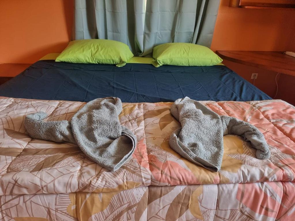 Postel nebo postele na pokoji v ubytování Moemoea Nui Villa