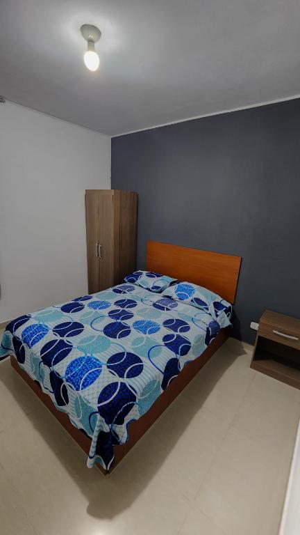 Postel nebo postele na pokoji v ubytování Hospedaje Villa Del Sol