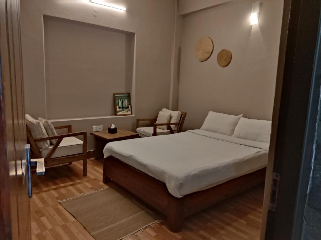 Letto o letti in una camera di Hotel Blossom