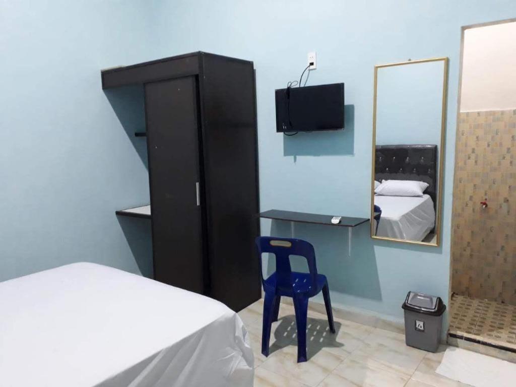 Μια τηλεόραση ή/και κέντρο ψυχαγωγίας στο OYO Life 92779 Kost Arjuna