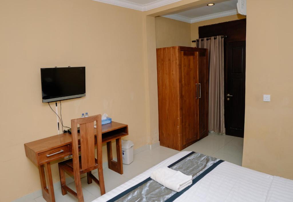 TV a/nebo společenská místnost v ubytování Dante Guesthouse