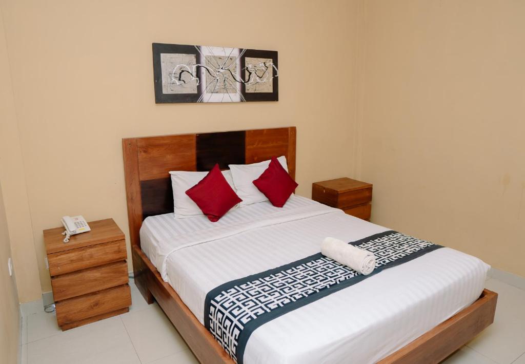 Postel nebo postele na pokoji v ubytování Dante Guesthouse