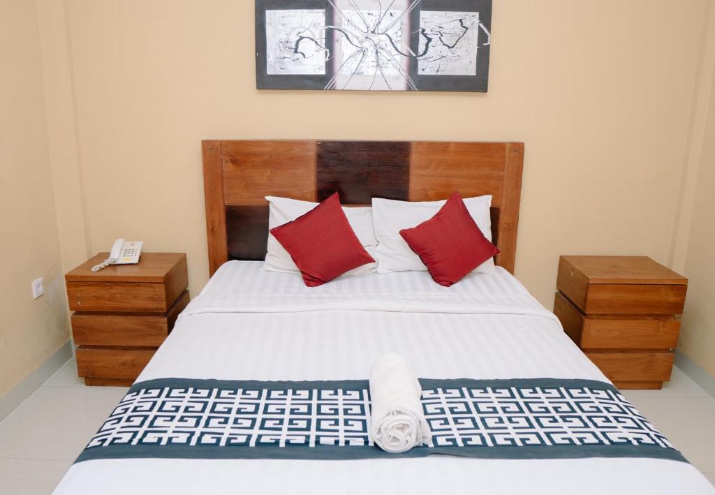 Postel nebo postele na pokoji v ubytování Dante Guesthouse