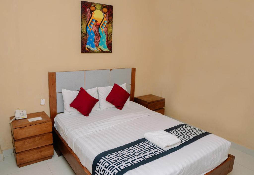 Postel nebo postele na pokoji v ubytování Dante Guesthouse