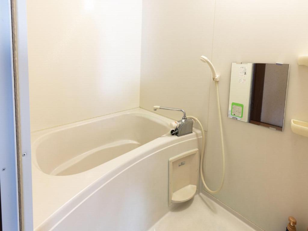 Koupelna v ubytování Otowaya Ryokan