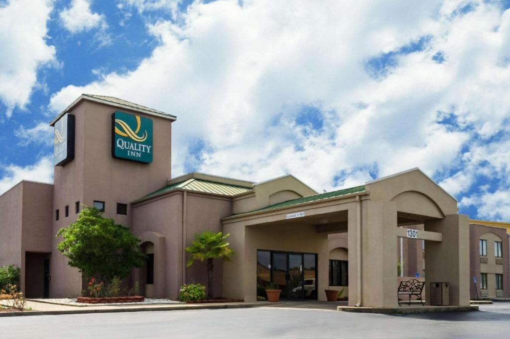 a front view of a quicken loans building at Quality Inn Meridian in Meridian