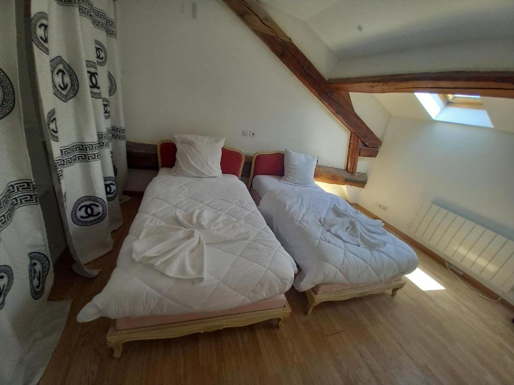 Postel nebo postele na pokoji v ubytování Résidence les jardins