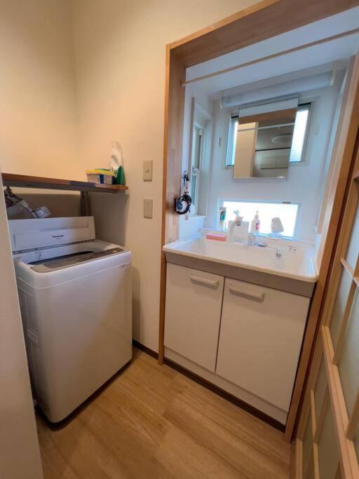 Kuchyň nebo kuchyňský kout v ubytování Misato Guest House