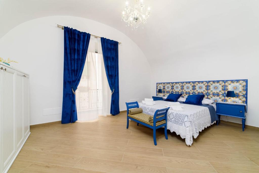 Кровать или кровати в номере Casa vacanze Mura Antiche
