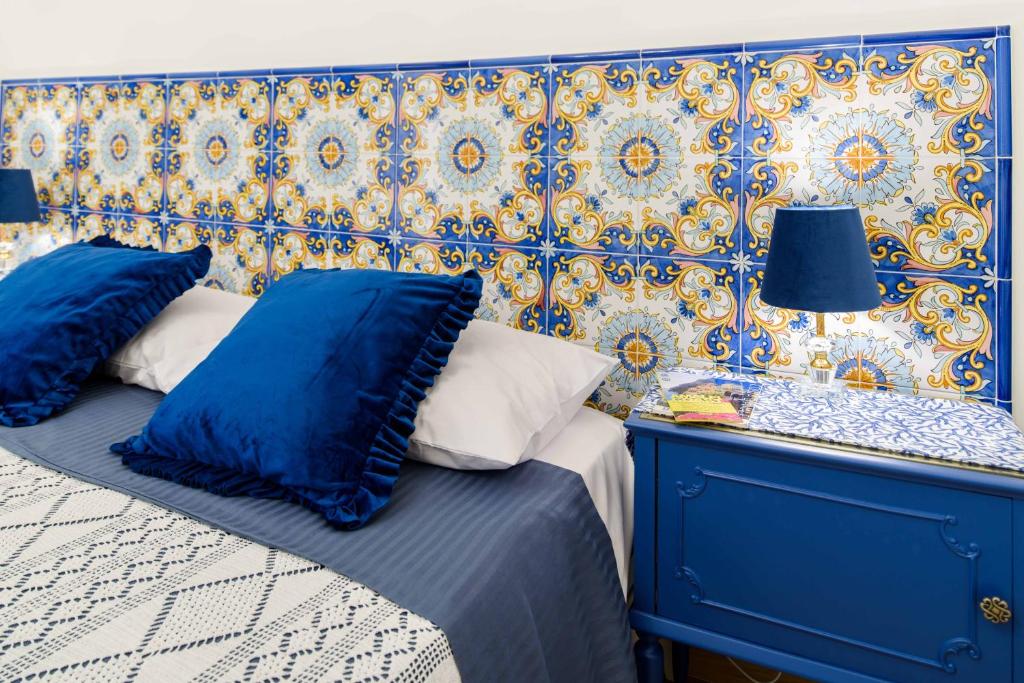 Кровать или кровати в номере Casa vacanze Mura Antiche