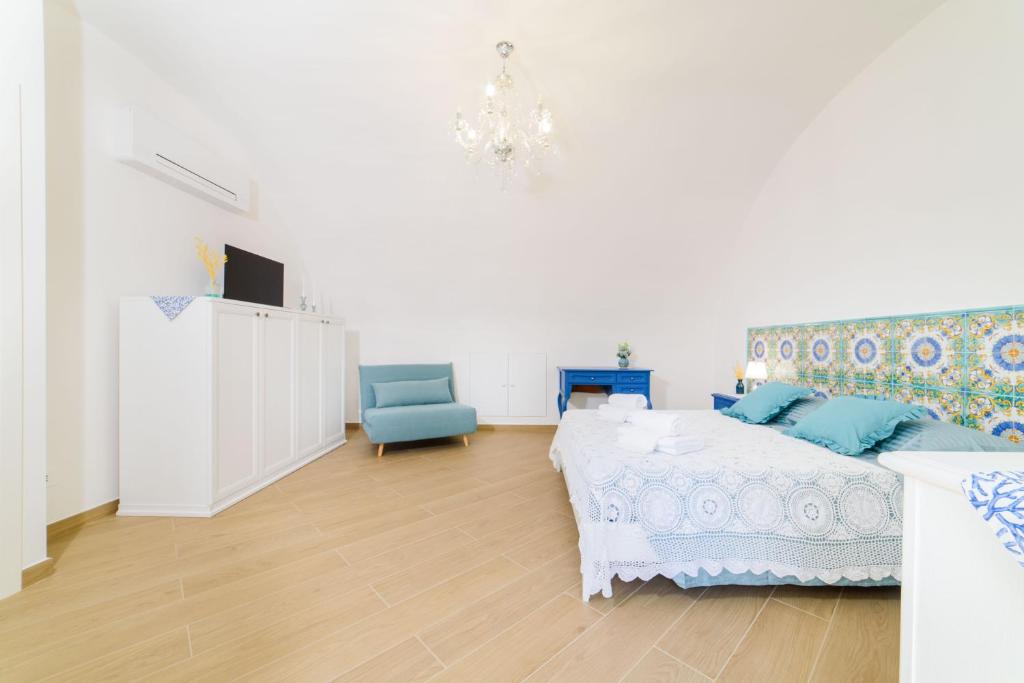 Телевизор и/или развлекательный центр в Casa vacanze Mura Antiche