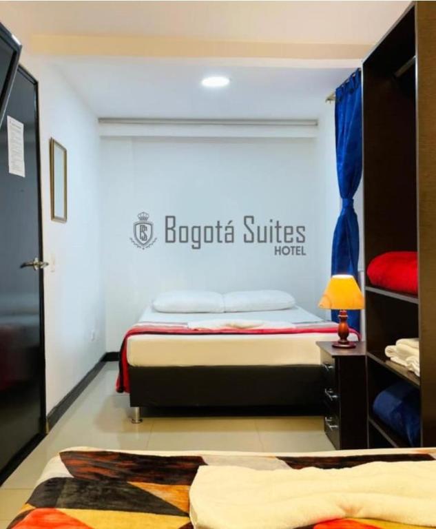 Postel nebo postele na pokoji v ubytování Hotel Bogotá Suites Teusaquillo