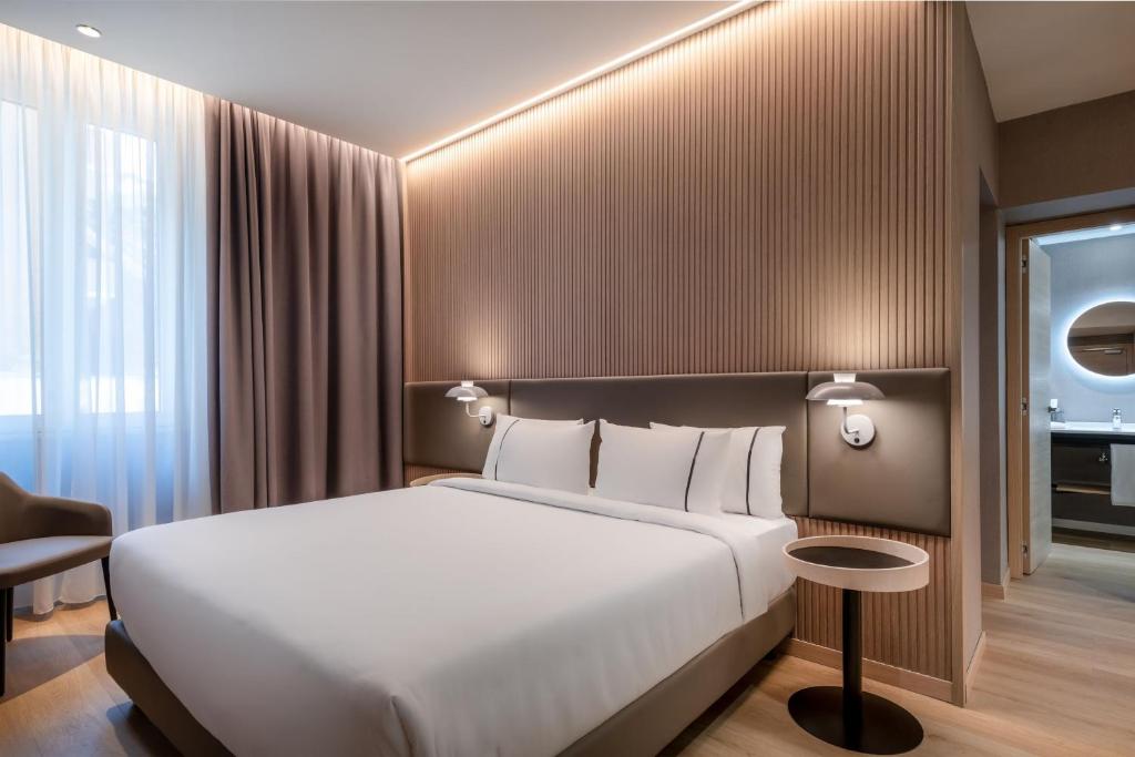 Postel nebo postele na pokoji v ubytování AC Hotel by Marriott Clodio Roma