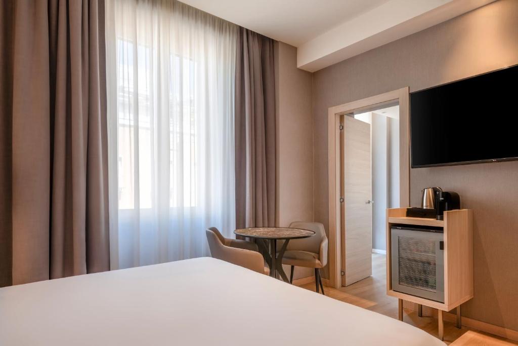 TV a/nebo společenská místnost v ubytování AC Hotel by Marriott Clodio Roma