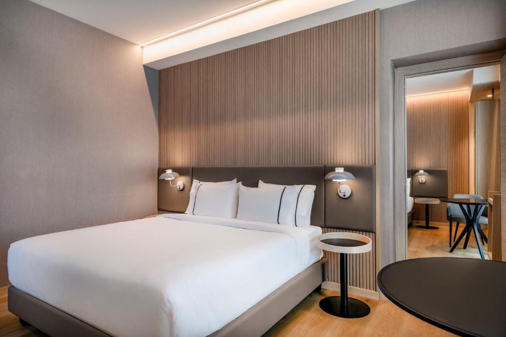Postel nebo postele na pokoji v ubytování AC Hotel by Marriott Clodio Roma