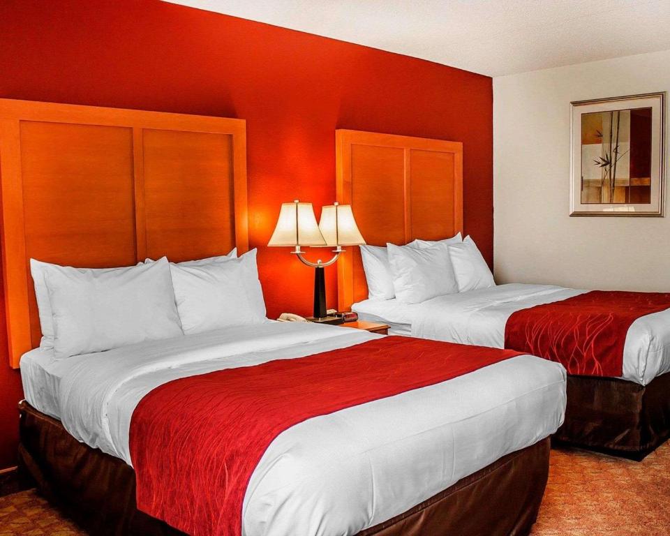 Postel nebo postele na pokoji v ubytování Quality Inn