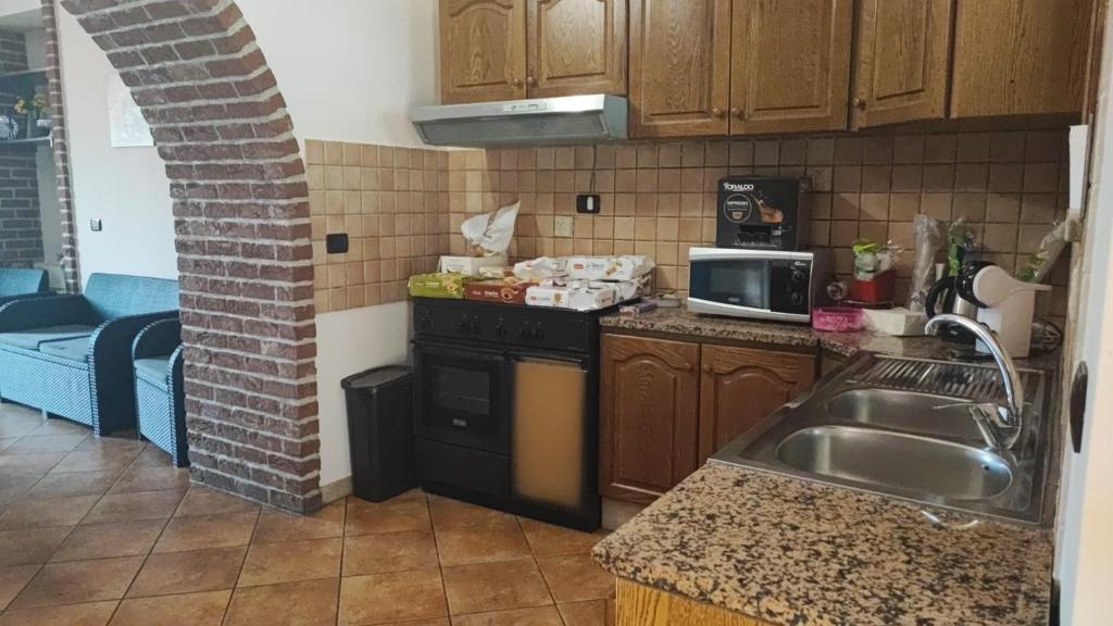 Kuchyň nebo kuchyňský kout v ubytování B&B EMPIRA Lamezia Terme