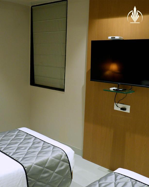 TV a/nebo společenská místnost v ubytování SIVANTA by BOMBAY GROUP OF HOTELS NAGPUR