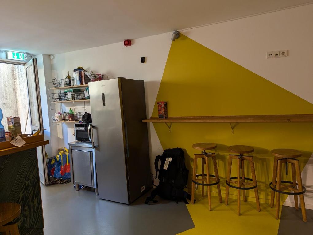 Kuchyň nebo kuchyňský kout v ubytování Backpackers St. Pauli