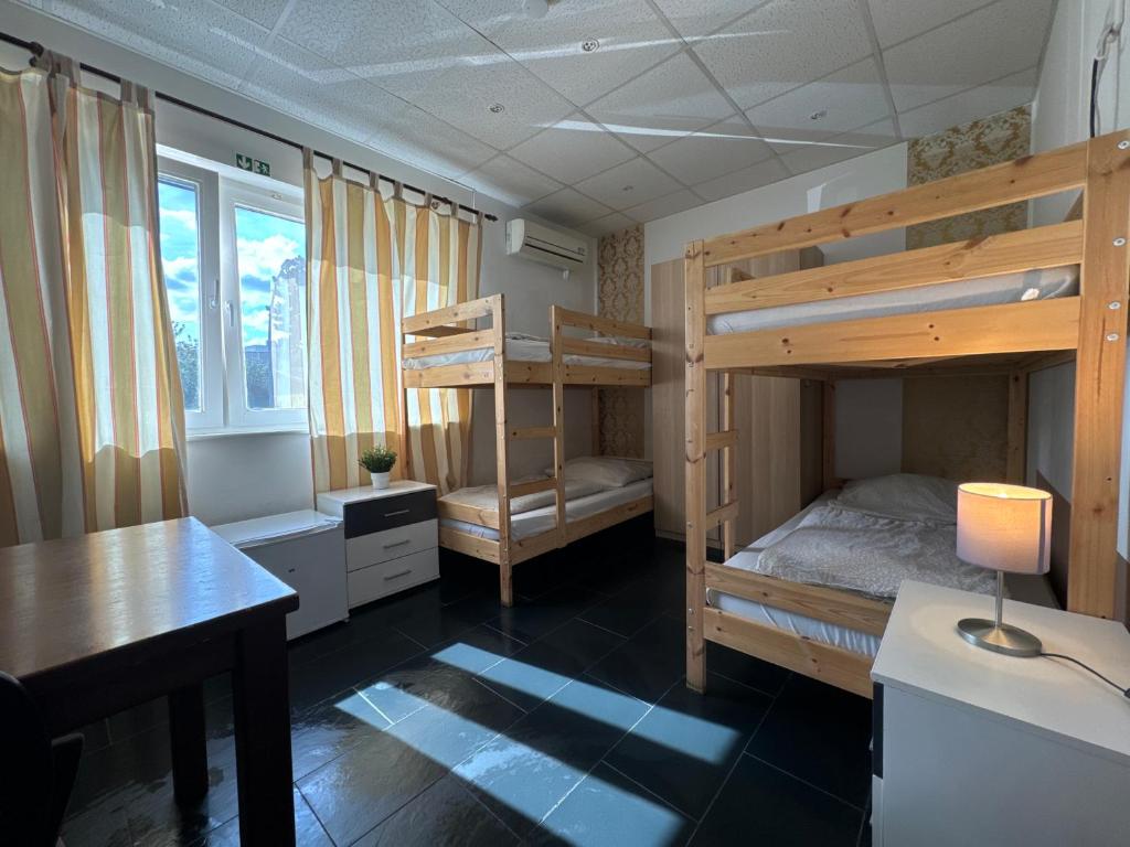 Postel nebo postele na pokoji v ubytování PREMIUM Hostel