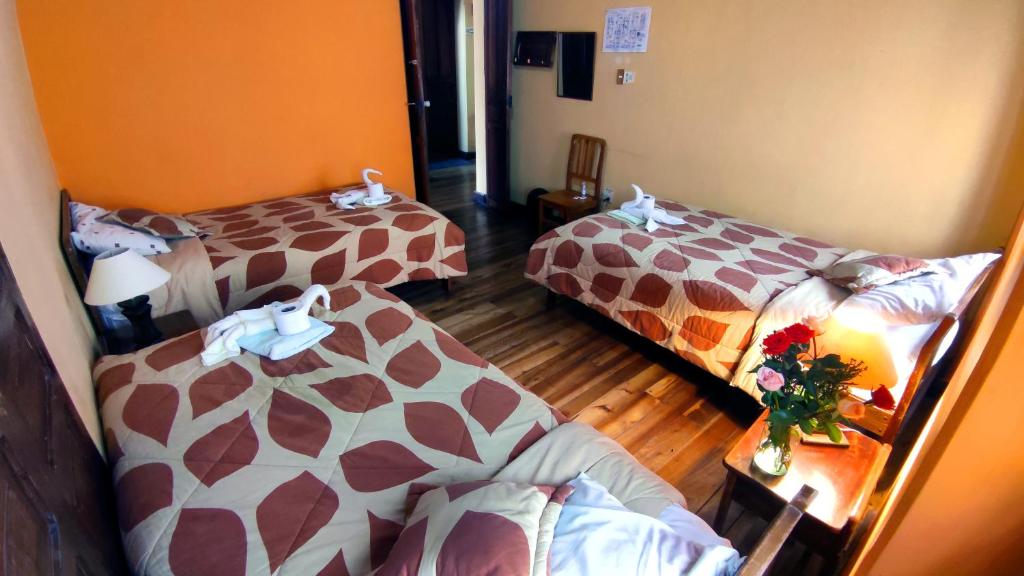 Postel nebo postele na pokoji v ubytování La Posada Colonial