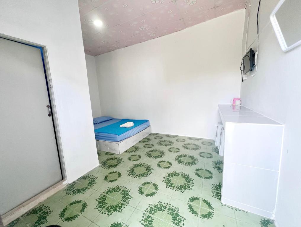 Postel nebo postele na pokoji v ubytování Rim Suan Resort