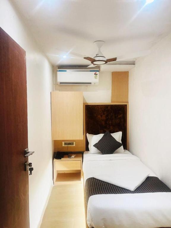 Postel nebo postele na pokoji v ubytování Hotel Winton