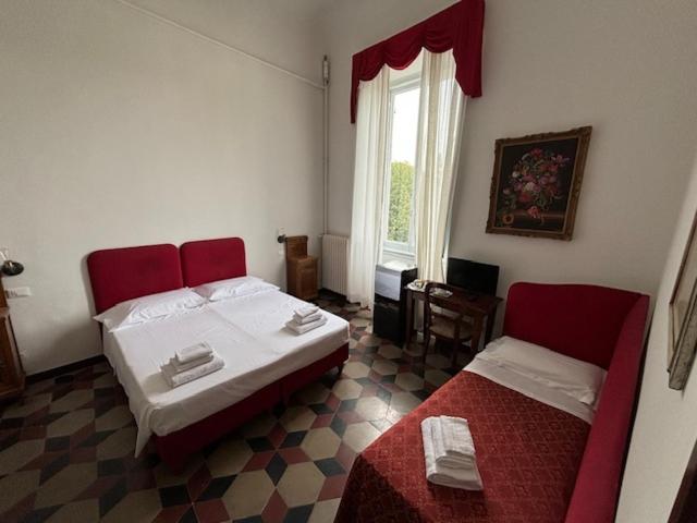 Postel nebo postele na pokoji v ubytování Hotel Annalena