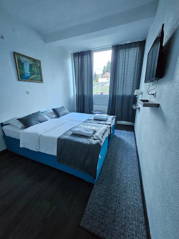 Postel nebo postele na pokoji v ubytování Bed and Breakfast M Jasmin