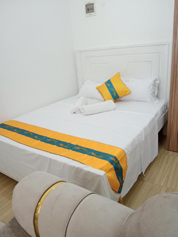 Postel nebo postele na pokoji v ubytování Reyna Apartments