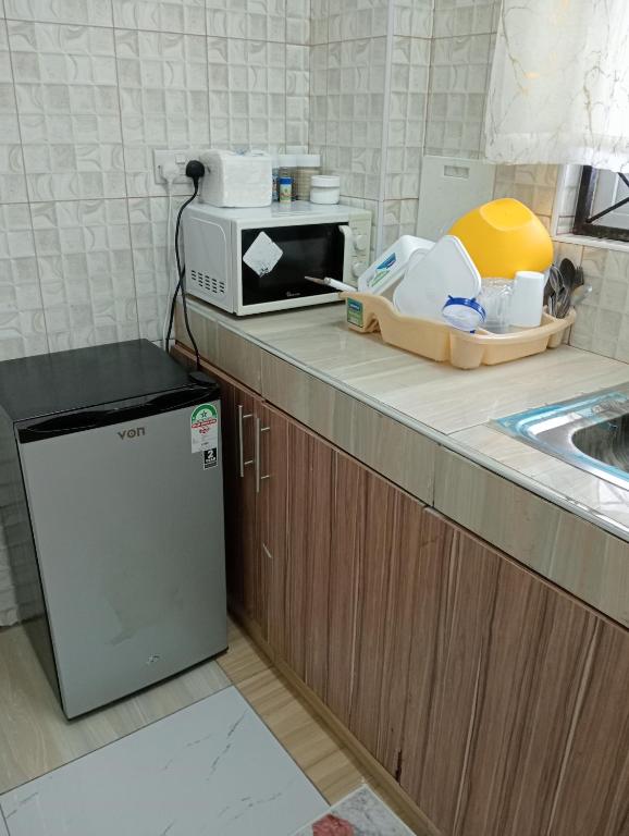 Kuchyň nebo kuchyňský kout v ubytování Reyna Apartments