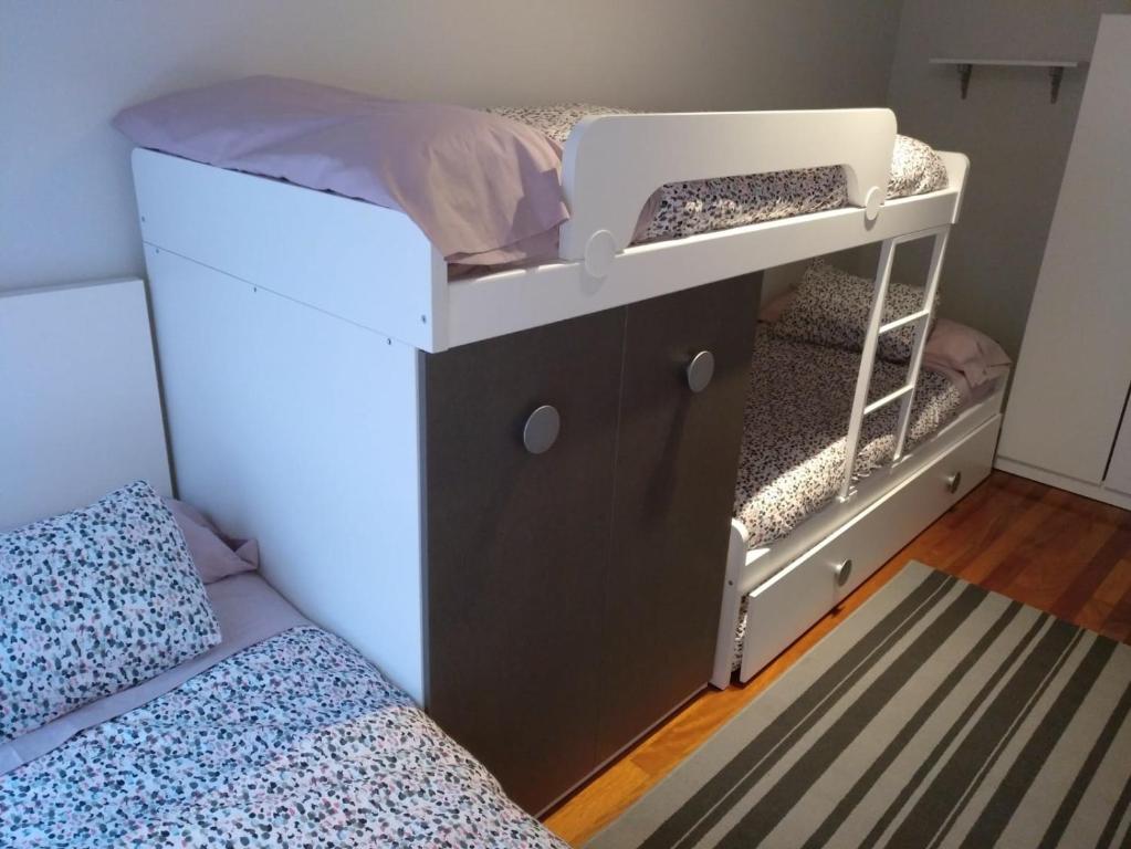 Postel nebo postele na pokoji v ubytování Vivienda Turística La Moleta