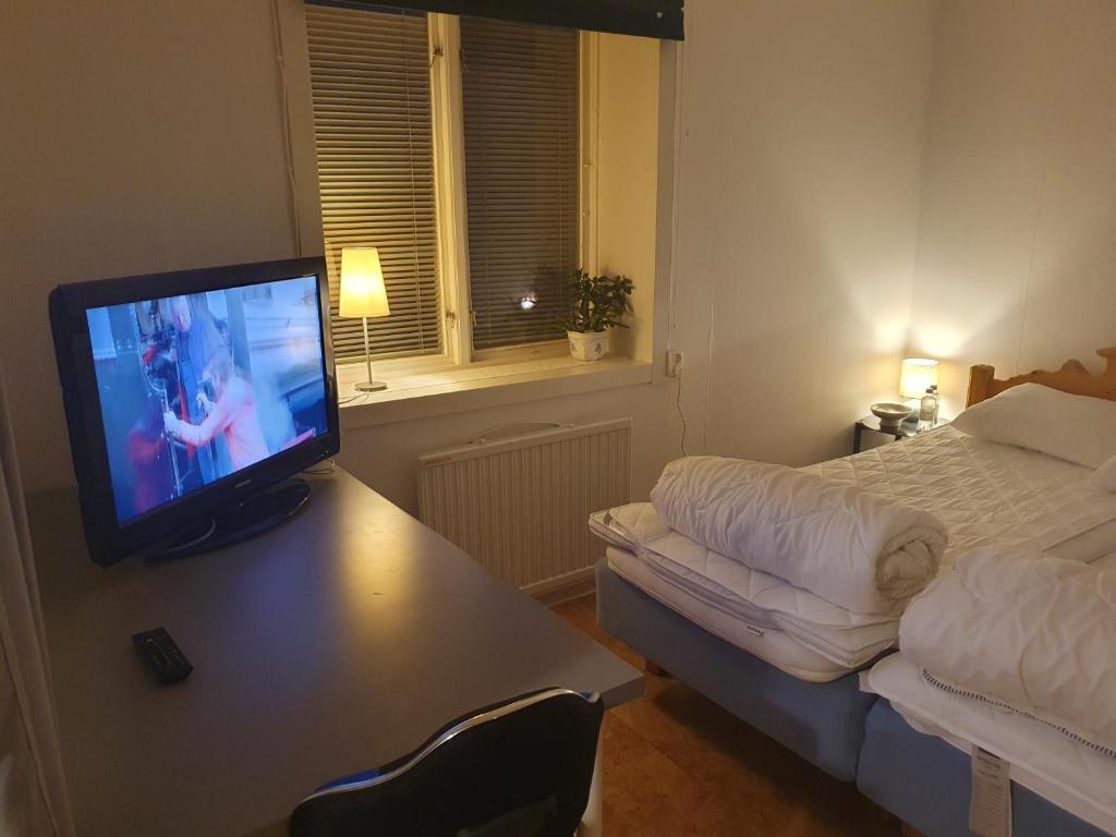 TV a/nebo společenská místnost v ubytování Eternus Paradise